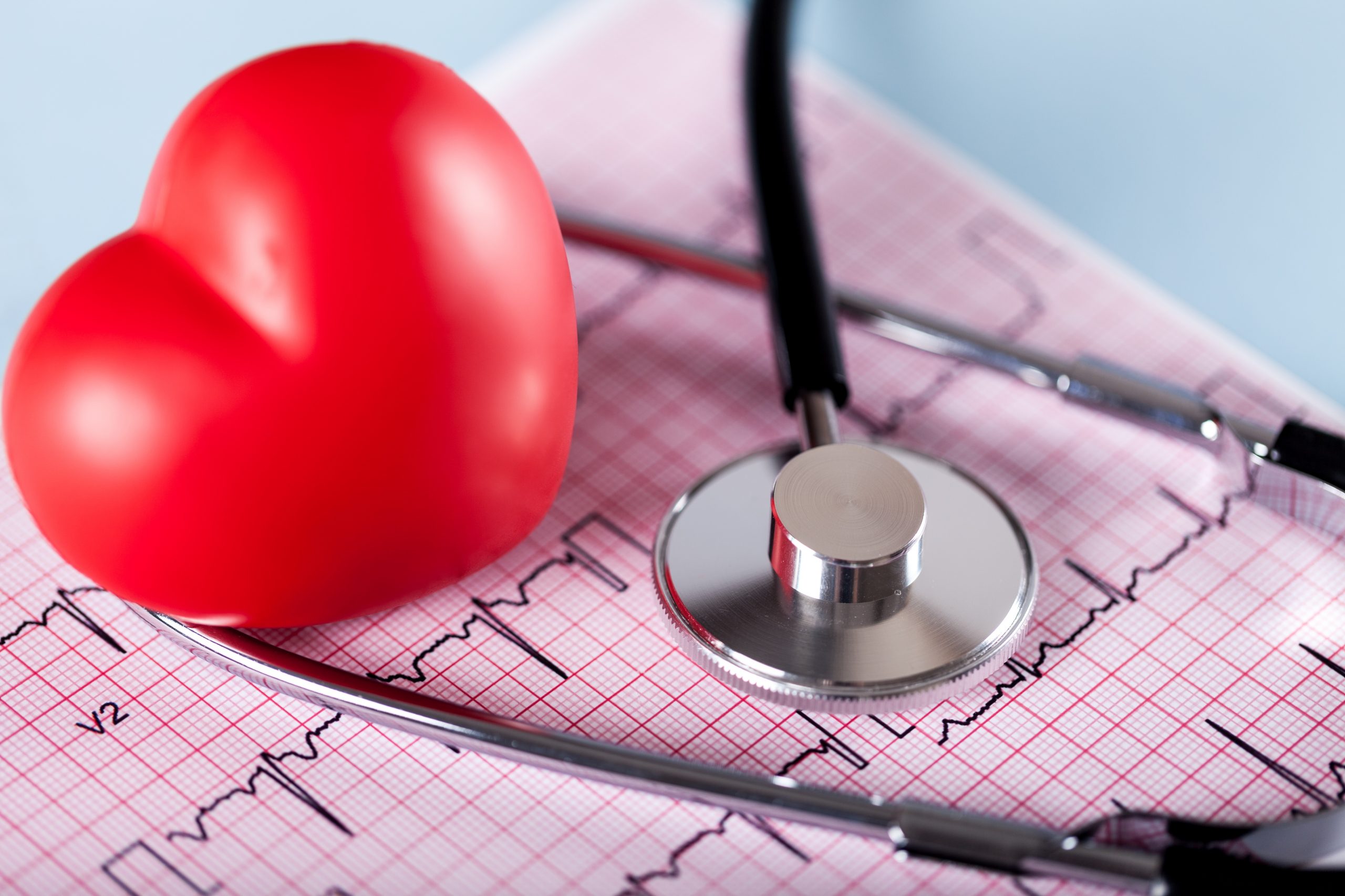 Medical Stethoscope with plastic Heart isolated on background